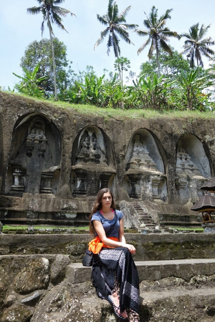 sitting by temple in bali