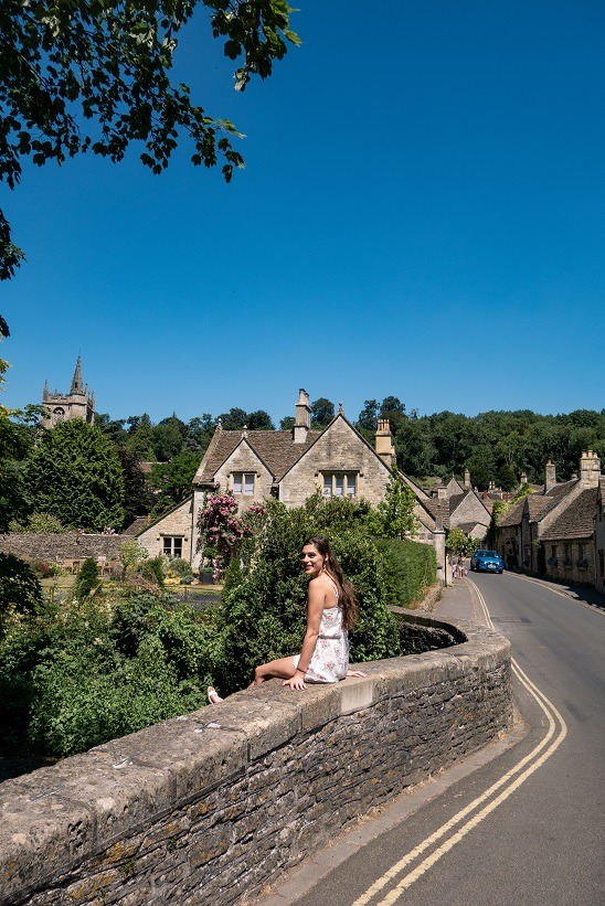 sitting on the bridge in cotswolds village