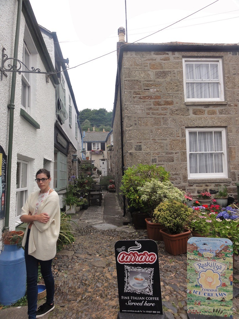standing outside a shop, cornwall