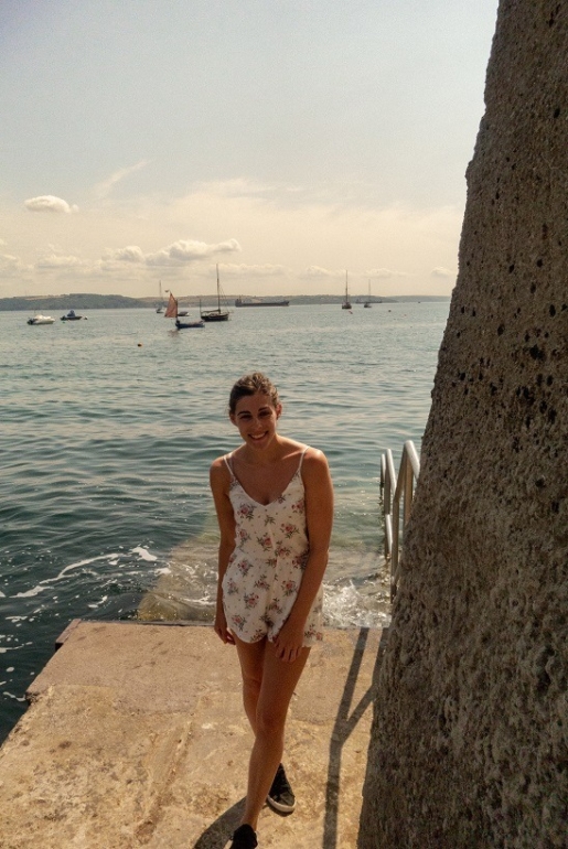 posing by the seafront