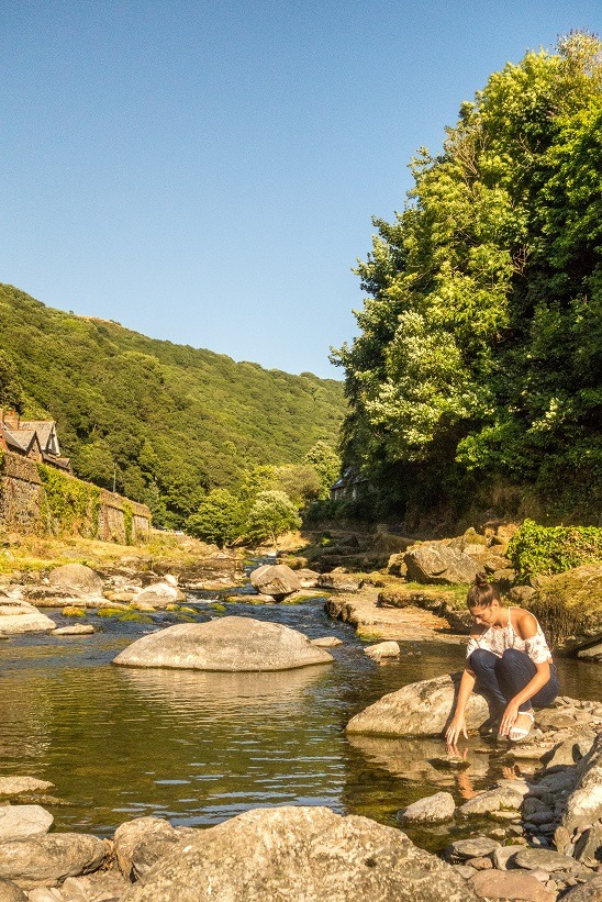 dipping hands on pretty stream, Lynmouth