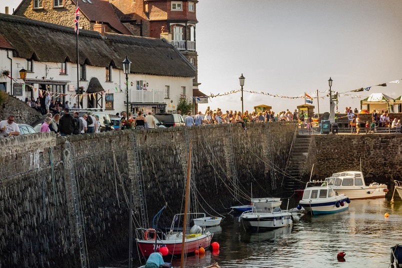 people crowded in harbour for Lynmouth Regatta