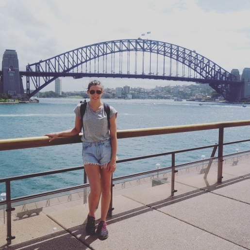 posing in front of Sydney Harbour bridge