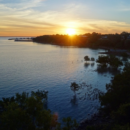 sun setting over ocean Darwin, Australia