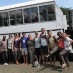 tour group by the bus in Tanzania