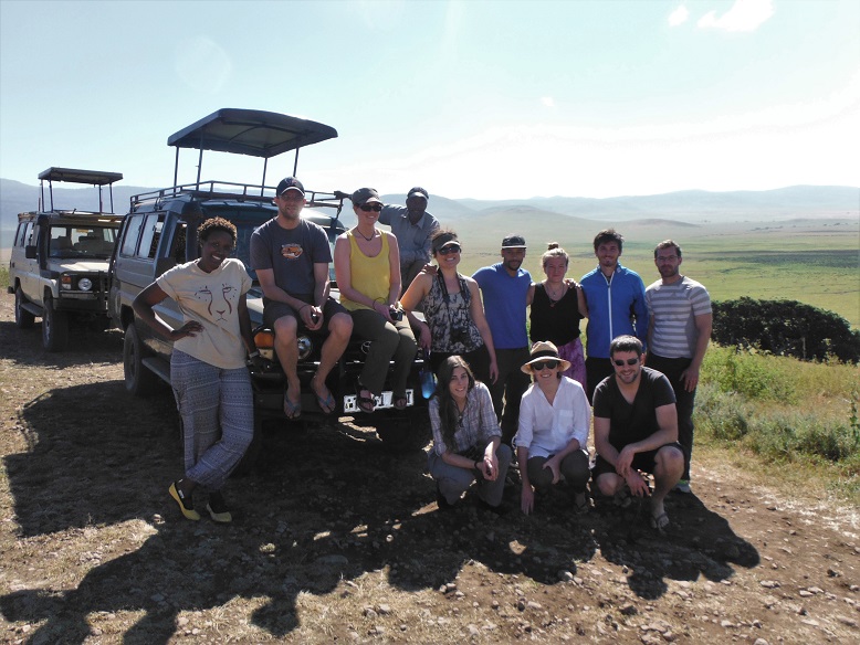 tour group next to jeep, serengeti