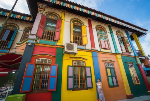 Standing in front of a colourful house, Little India, Singapore