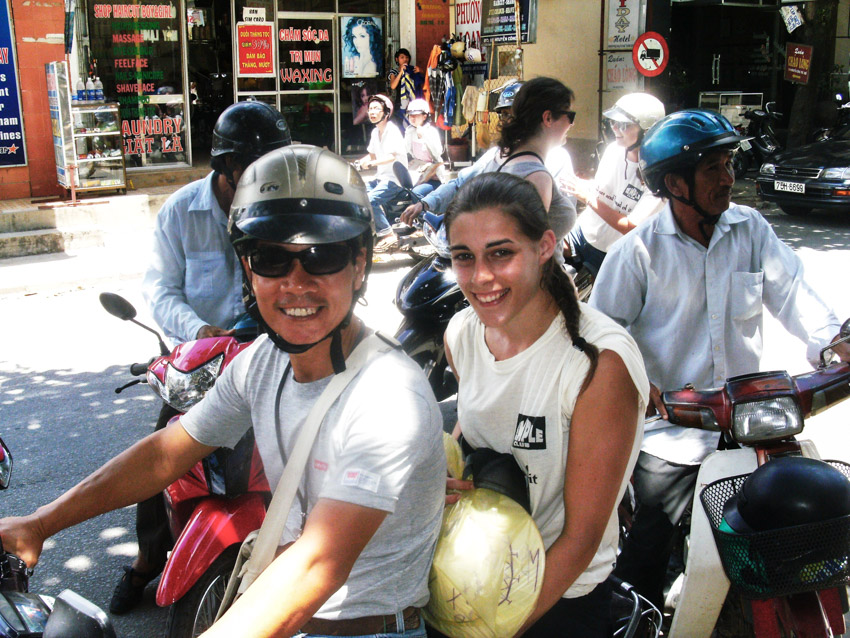 sitting on the back of a motorbike in Vietnam