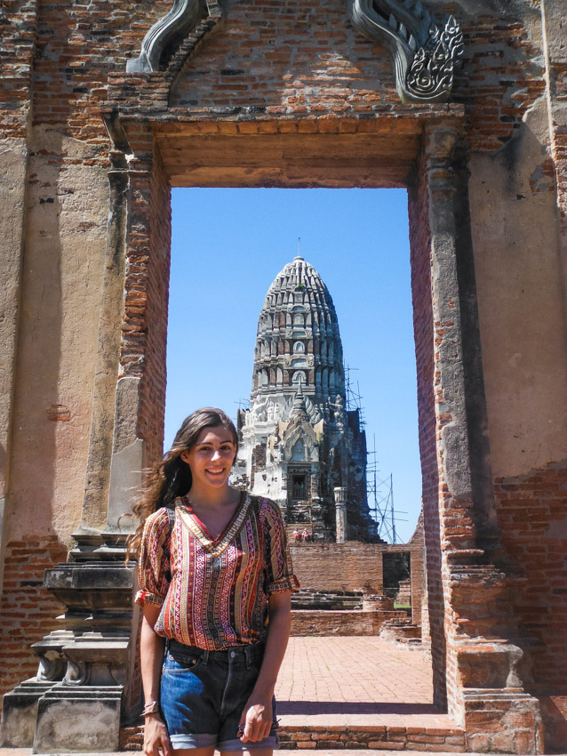 posing in front of temple in Ayutthaya Historical Park