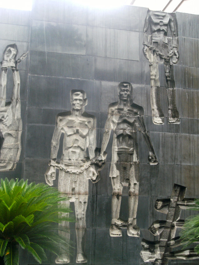slave carvings at Hoa Lo prison