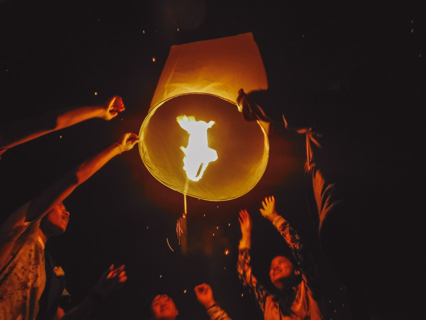 releasing lantern into the air