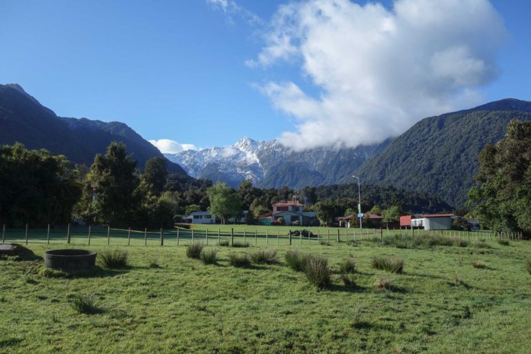 green grass and mountains