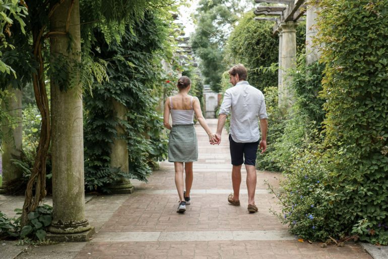 walking through tree lined path