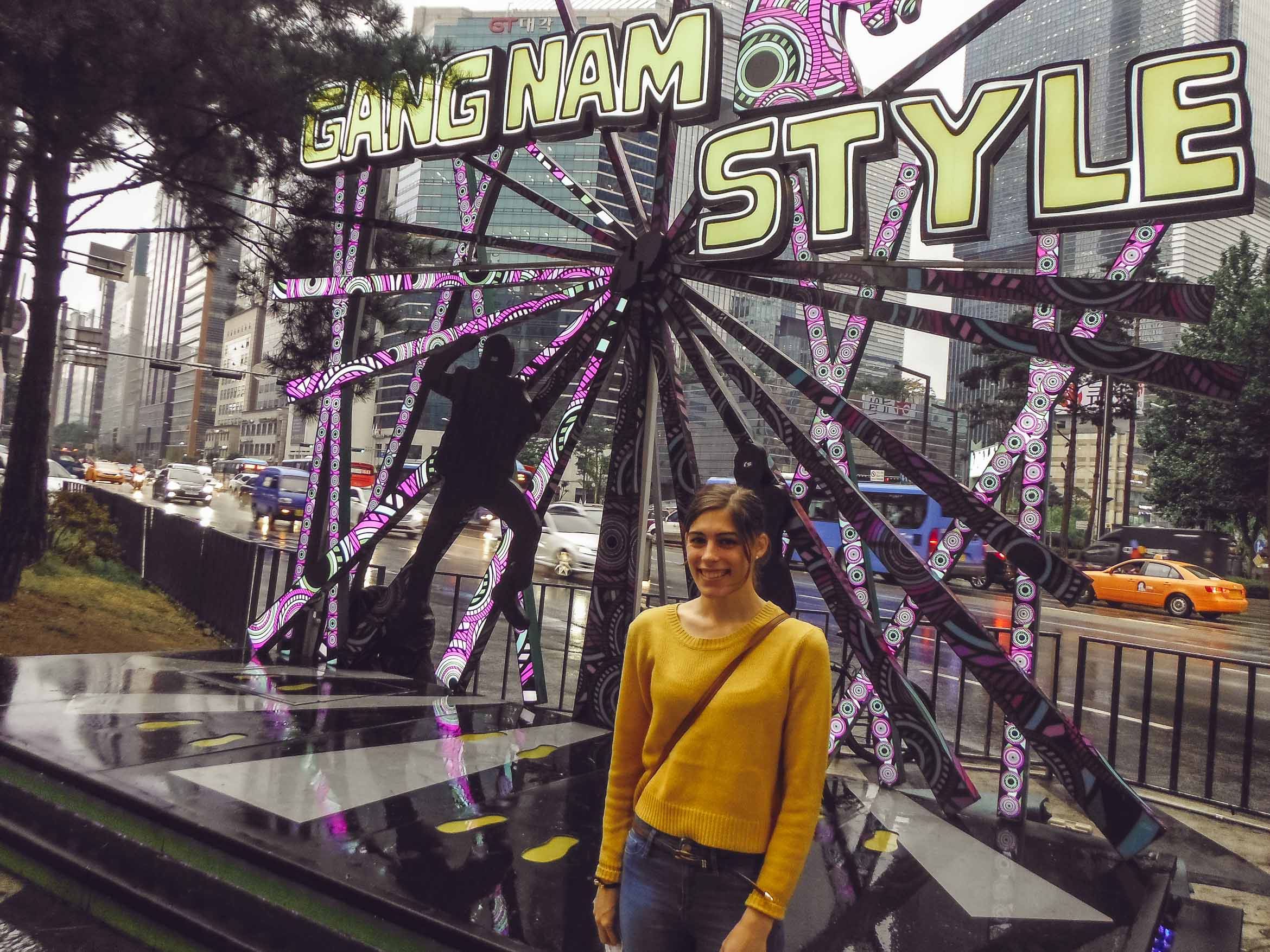 in front of Gangnam sign
