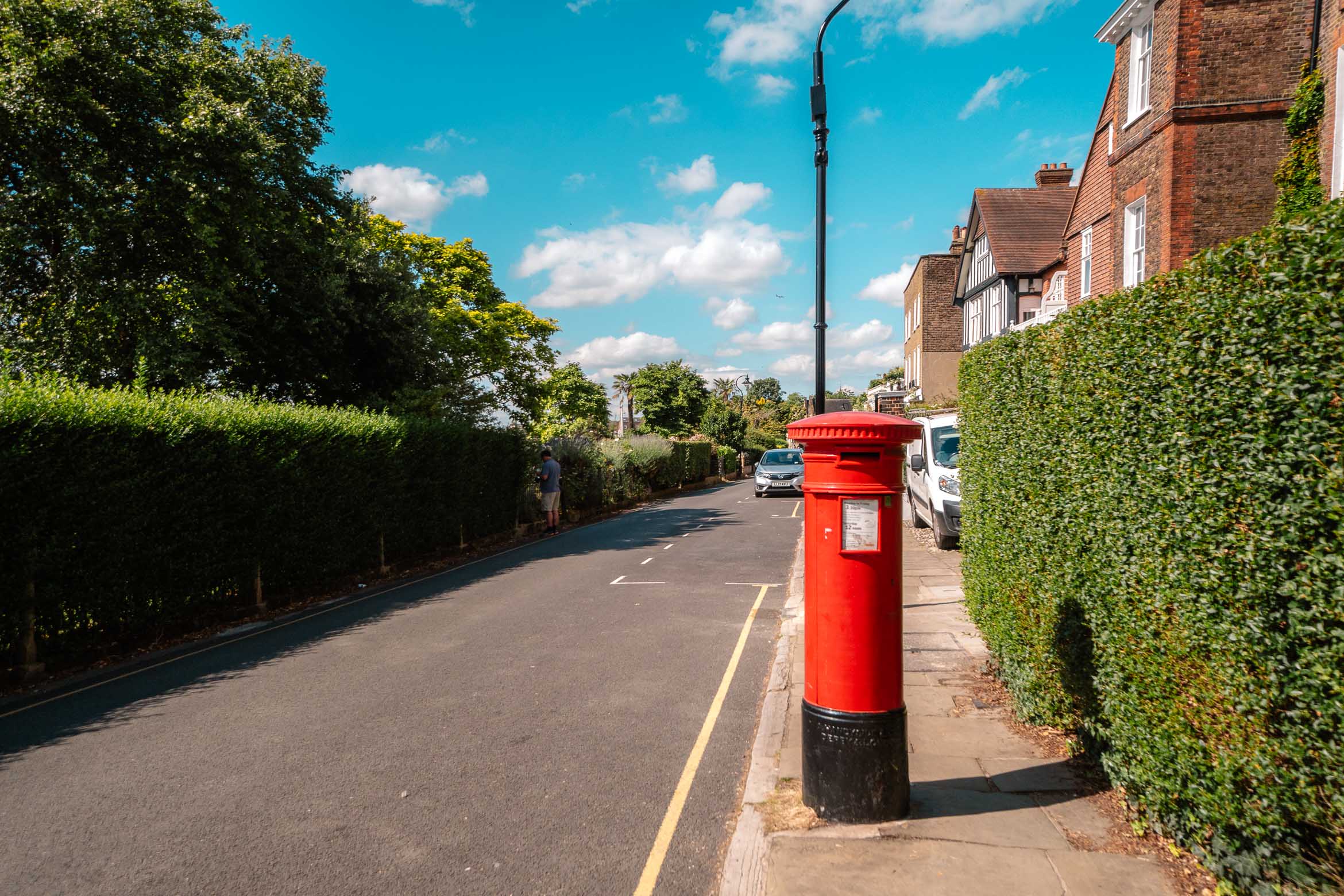 red post box on london street