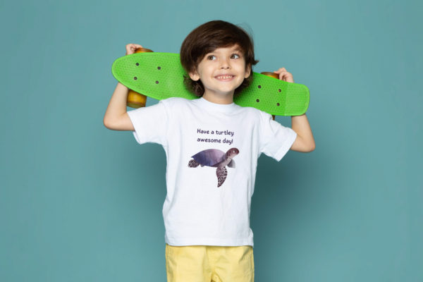 boy wearing turtle tshirt