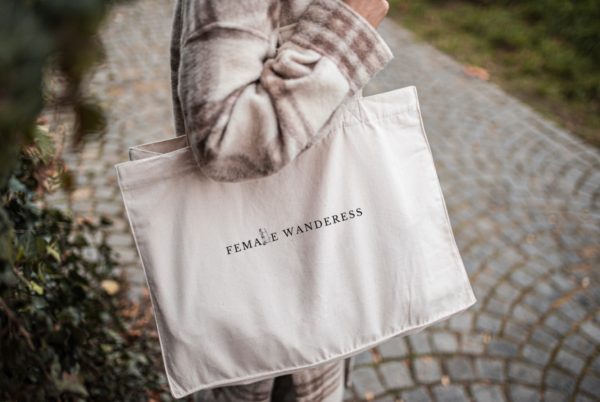 female wanderess travel tote bag